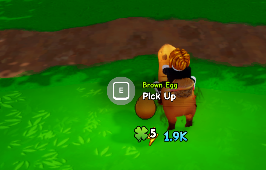 A Ride A Pet Roblox map egg sitting in the grass with its own name label reading Brown Egg, the Pick Up prompt below it, and a clover tag of 5 beside the egg